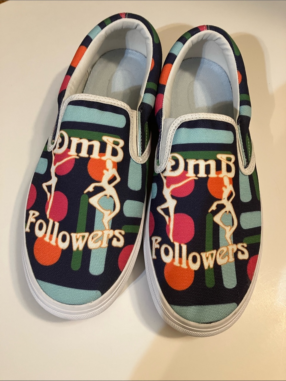 Three in Custom Designed Women’s 8.5 Slip on Canvas w/ DmB Followers on front